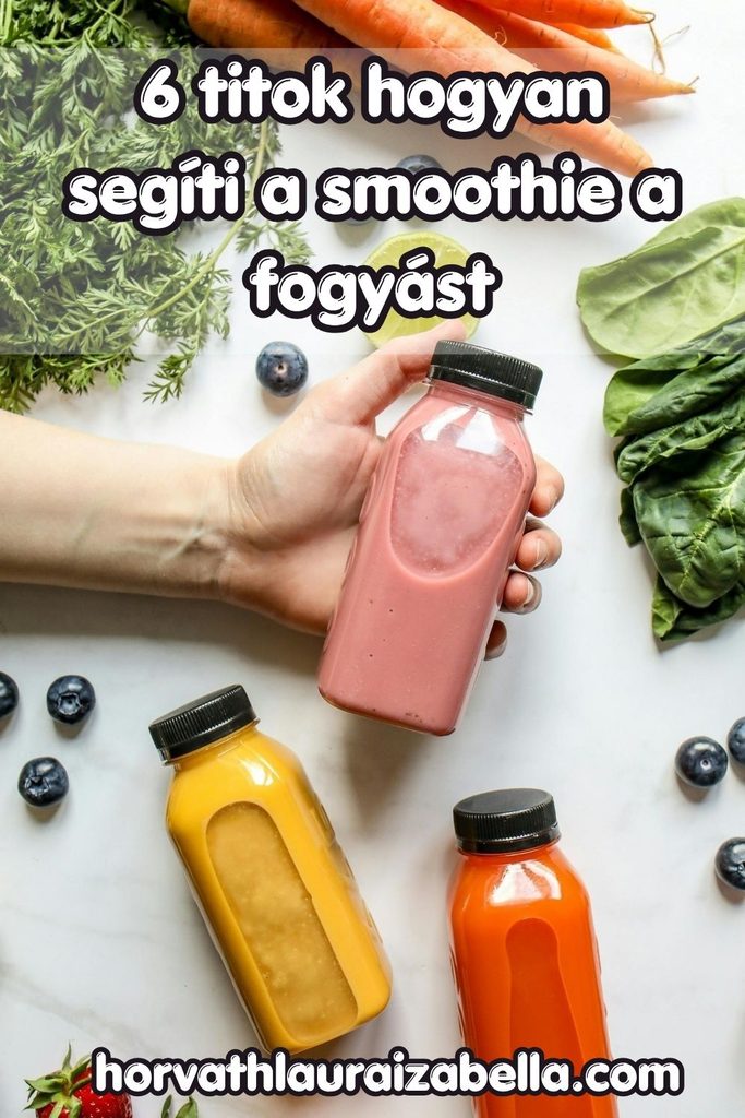 6 titok, hogyan segít a smoothie a fogyásban – feliratos Pinterest-kép zöldségek és gyümölcsök felett, kézzel, amint sárgarépát vesz el